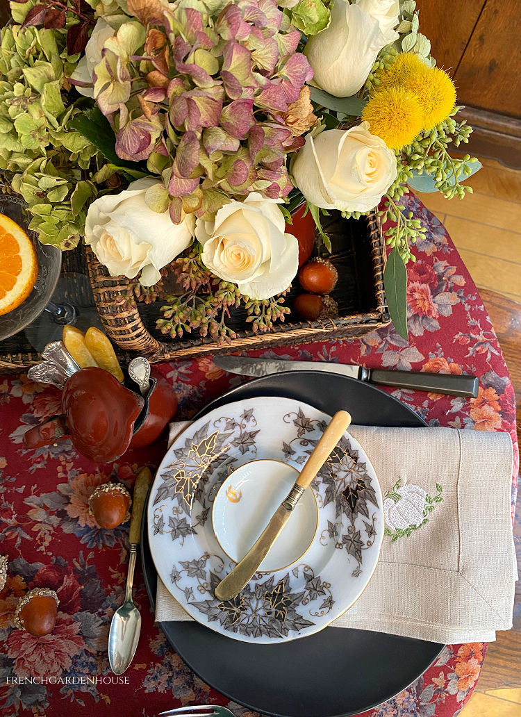 Thanksgiving table set with French Country antiques and hydrangeas and roses