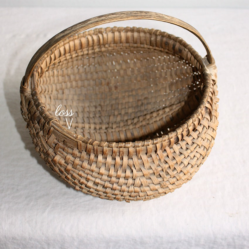 19th Century French Panier à Fesses with rich original patina, rustic country décor showing minor loss