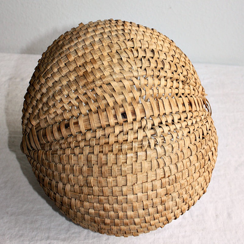 bottom view of 19th Century French Panier à Fesses highlighting woven craftsmanship