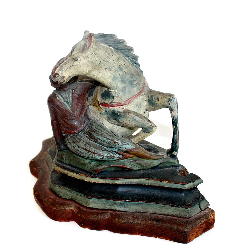 Close view antique hand carved wood horse figure with original painted finish, early 20th century equestrian sculpture detail