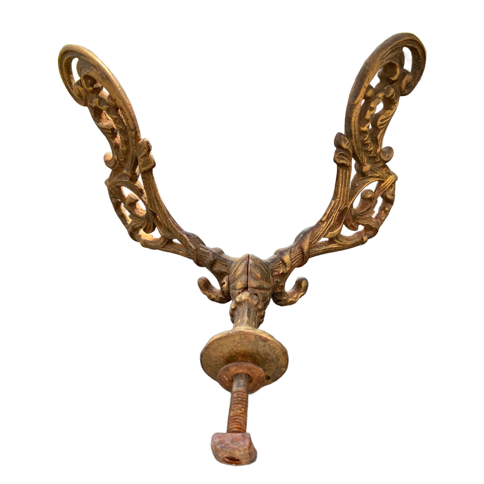 Antique Louis XV style double coat hook in heavy cast iron featuring decorative acanthus leaves and a weathered golden finish.