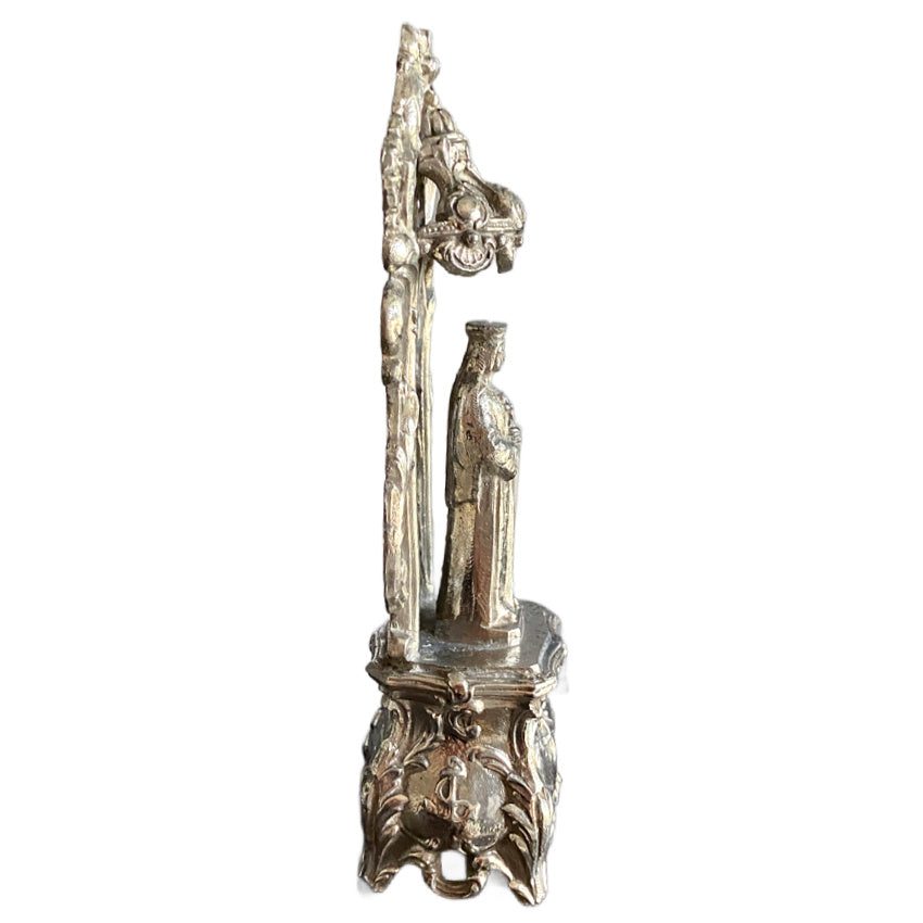Antique Madonna statue with ornate decorative base