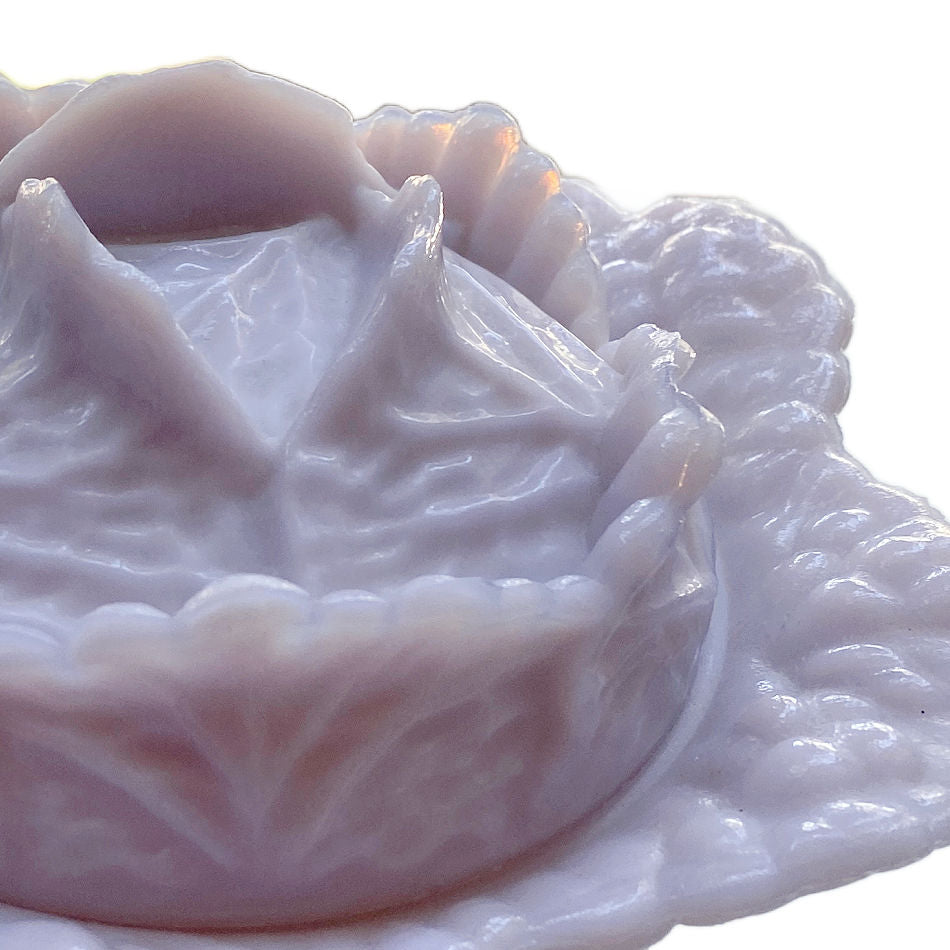 close-up of antique cabbage bowl leaf detail in lavender or lilac opaline glass