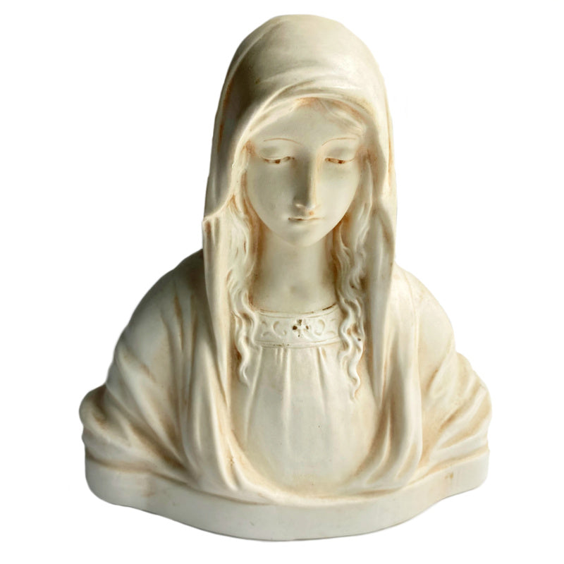 Serene and quite lovely, this Art Deco Bisque Bust of the Madonna is beautifully made and finished in an aged cream. A beautiful antique Madonna.