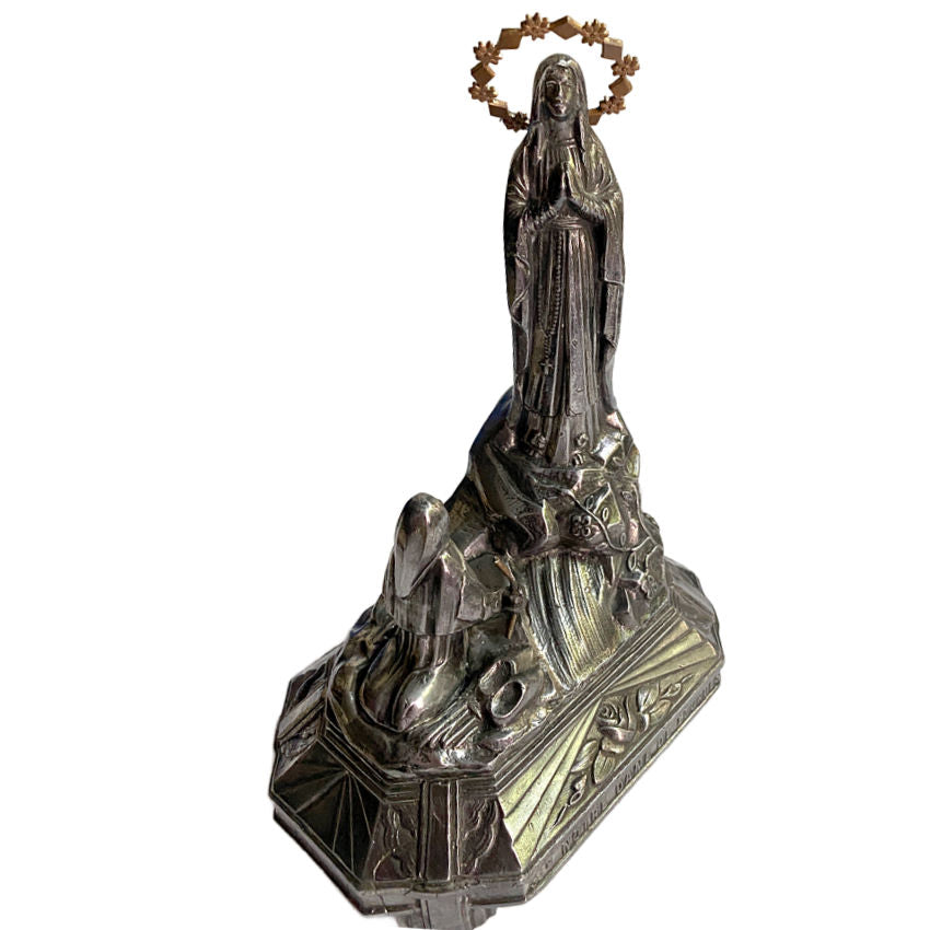 Side view of antique Art Deco French Virgin Mary statue, heavy metal sculpture with decorative rose motifs.