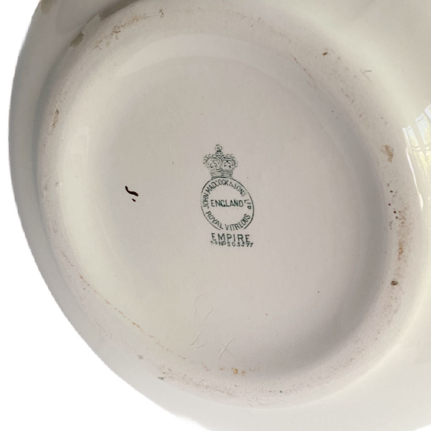 Bottom of antique Royal Ironstone pitcher showing John Maddock & Sons Burslem, England mark, Empire pattern, 19th-century Staffordshire design.