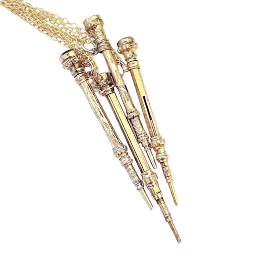 Antique gold chatelaine pencil necklaces - rare 19th-century writing accessory worn as jewelry, rich in history.