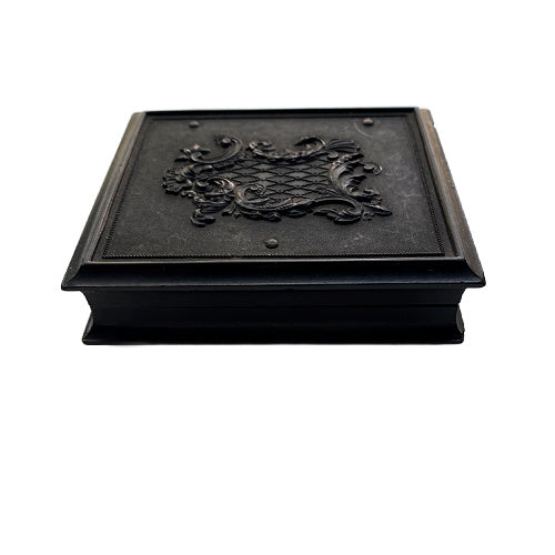 Antique Union case with elegant scrolled pattern, signed James & Co, featuring a single 19th-century woman portrait inside. Collectible photographic case.