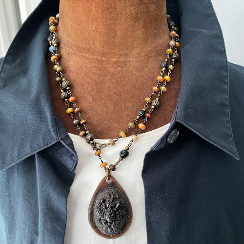 Antique Victorian gutta percha pendant on a tonal semi-precious beaded chain, 19th century, rare collectible jewelry, exquisite craftsmanship, collector’s piece.