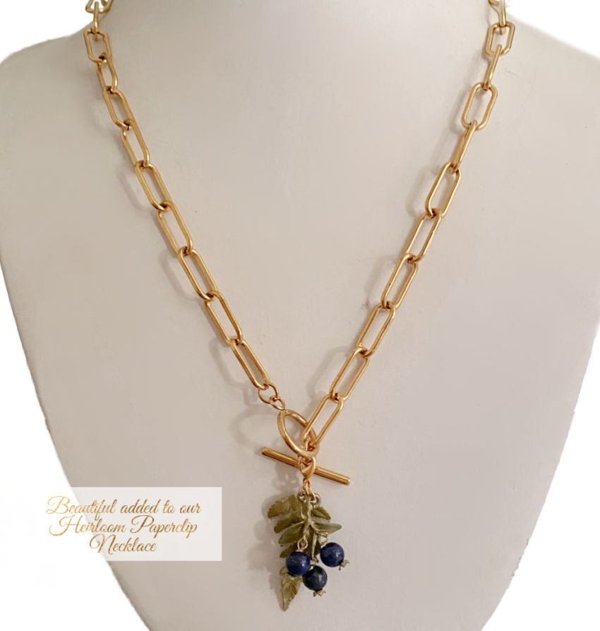 Elegant fern charm with finely detailed fronds and patinated finish, perfect for layering with other charms-collectible jewelry
