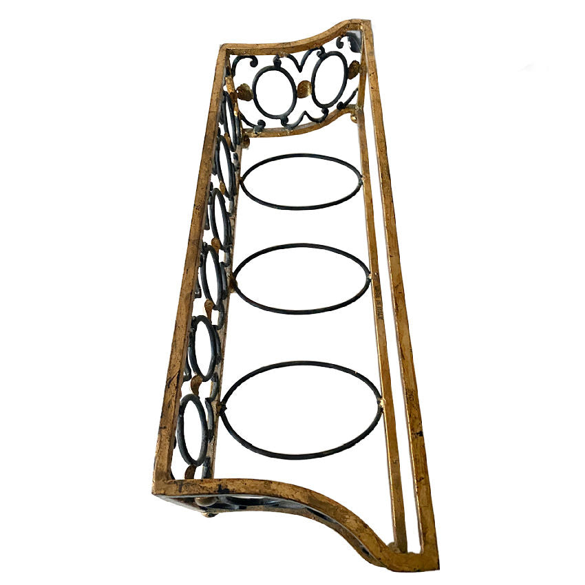 Angled view of Italian Tole Planter exterior in black with hand-applied gold accents, shown apart from removable liner, showcasing sculptural Florentine artistry.