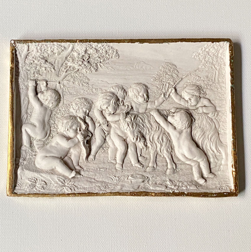 Classical European inspired wall relief art soft romantic interior scene