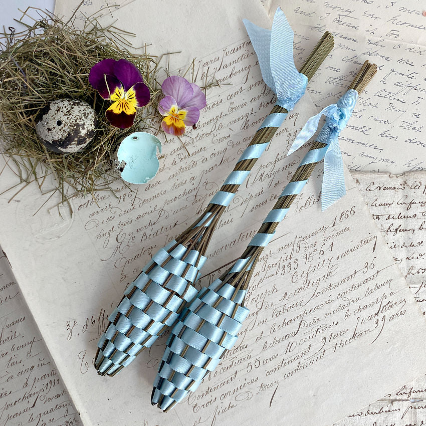 Set of two petite handwoven French lavender wands in light blue. Traditional Fuseau de Lavande crafted with high essential oil Lavandula on antique french letters with pansies and small blue eggs