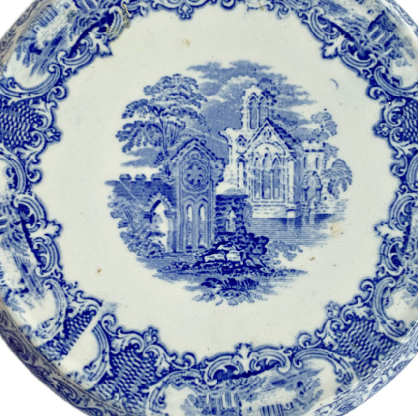 Late 19th century Petrus Regout blue and white transferware tea trivet in perfect condition. Crisp pastoral scene and classic Victorian charm.