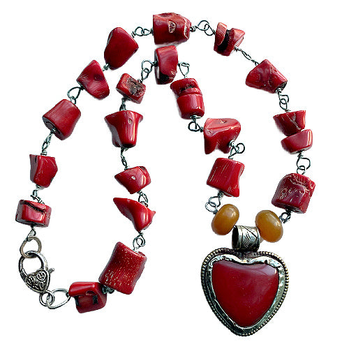 Statement necklace with gorgeous bamboo coral, in a luscious deep red. Local folklore says coral attracts love and prosperity. Hand made USA.