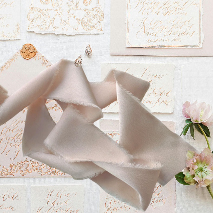 Soft, luxurious 1½-inch silk-feel ribbon in very light pink. Elegant Parisian trim for gift wrapping, décor, and couture-inspired creations.