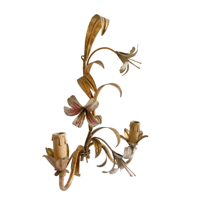 Close-up detail of hand-painted lily flowers on vintage Italian tole wall lights side view