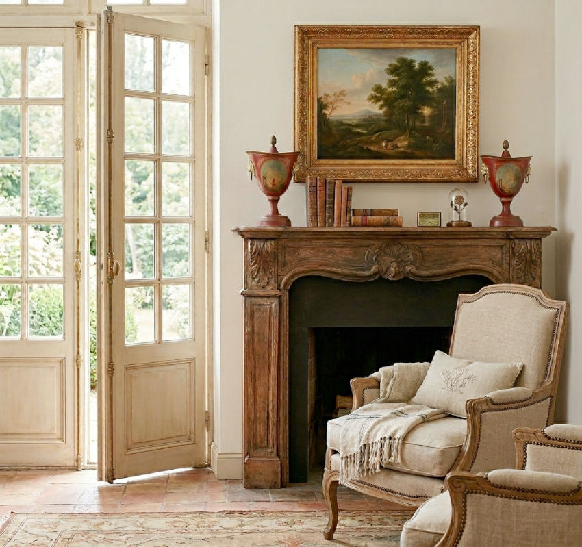 Antique French country style mantel urns in red with hand painted scenes.
