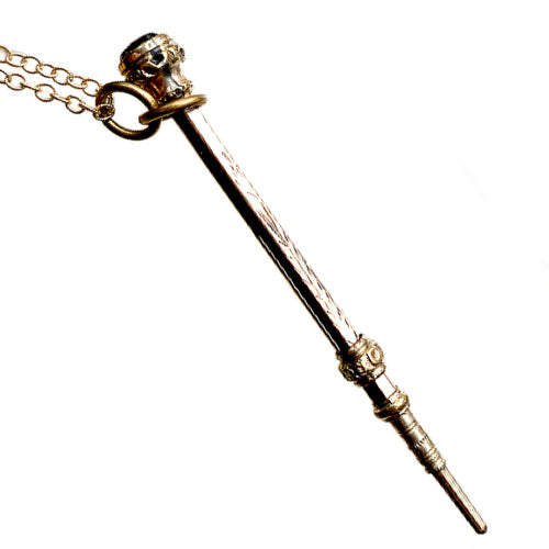 Antique gold-filled chatelaine pencil necklace with red garnet. A rare 19th-century writing accessory worn as jewelry, rich in history.