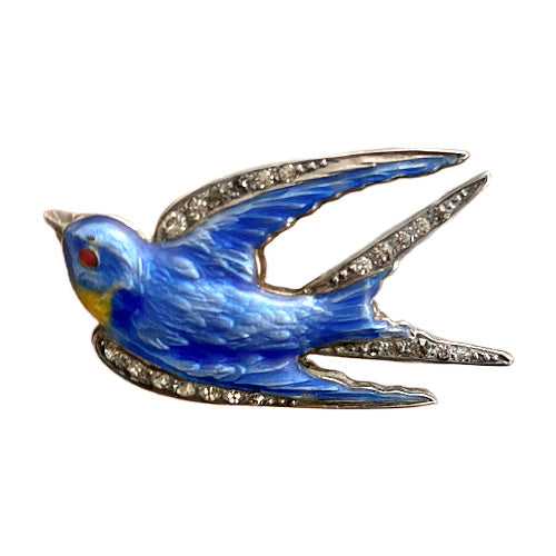 Rare Paye & Baker sterling silver swallow brooch with guilloché enamel and paste stones, c.1901–1910, a prized early Art Deco jewel.
