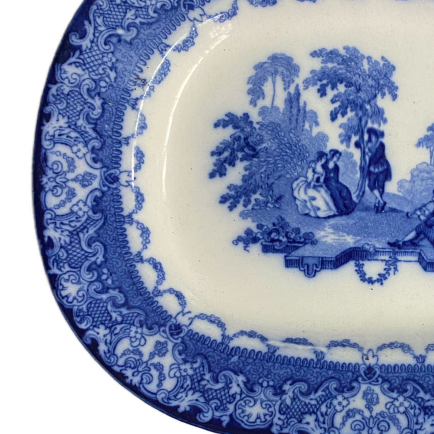 Royal Doulton antique oval platter, soft flowing blue glaze, Victorian-era English transferware ornate floral border