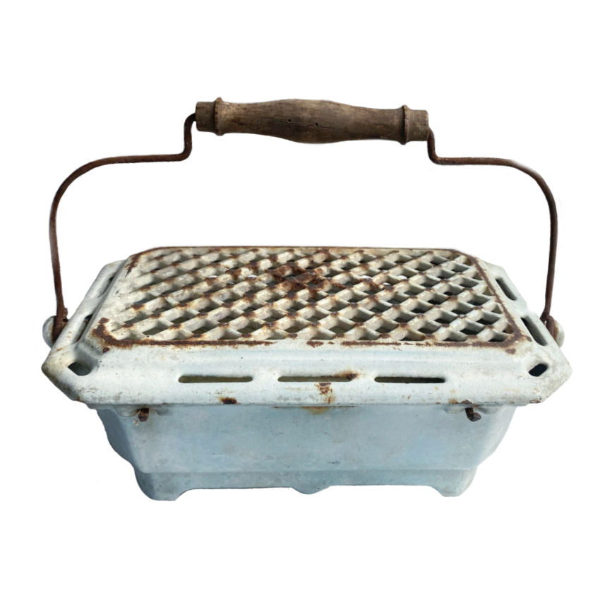 A rare 19th-century French enamelware warmer in faded robin’s egg blue. Cast iron, romantic and functional, perfect as a foot warmer, table dish warmer, or decorative accent.