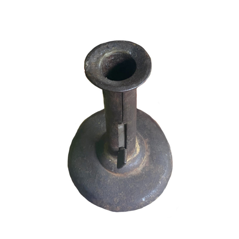 Antique 19th century French candle stand with push-up mechanism, worn iron surface, and understated rural character.