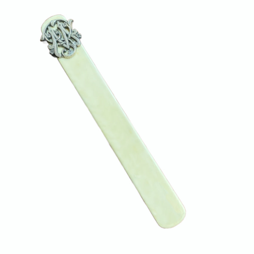 Victorian book page turner with silver monogram