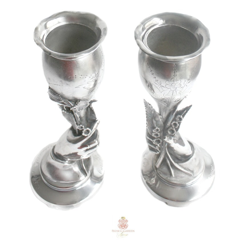Rare pair of 9½" antique silver plated hand vases with Lily of the Valley motif; exquisite Victorian detail and patina—stunning botanical decorative pieces.