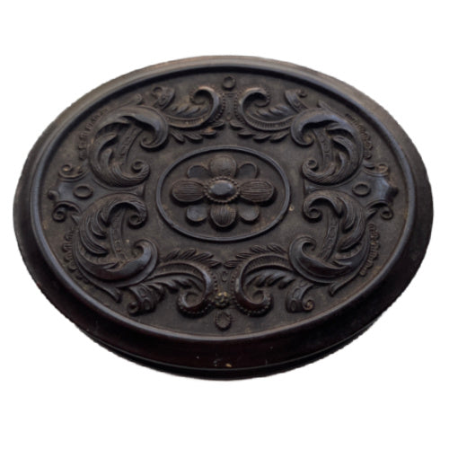 Antique oval union case by A. B. Chapman featuring floral rosette and ornate scrollwork. Authentic Victorian thermoplastic photographic case, mid-1800s.