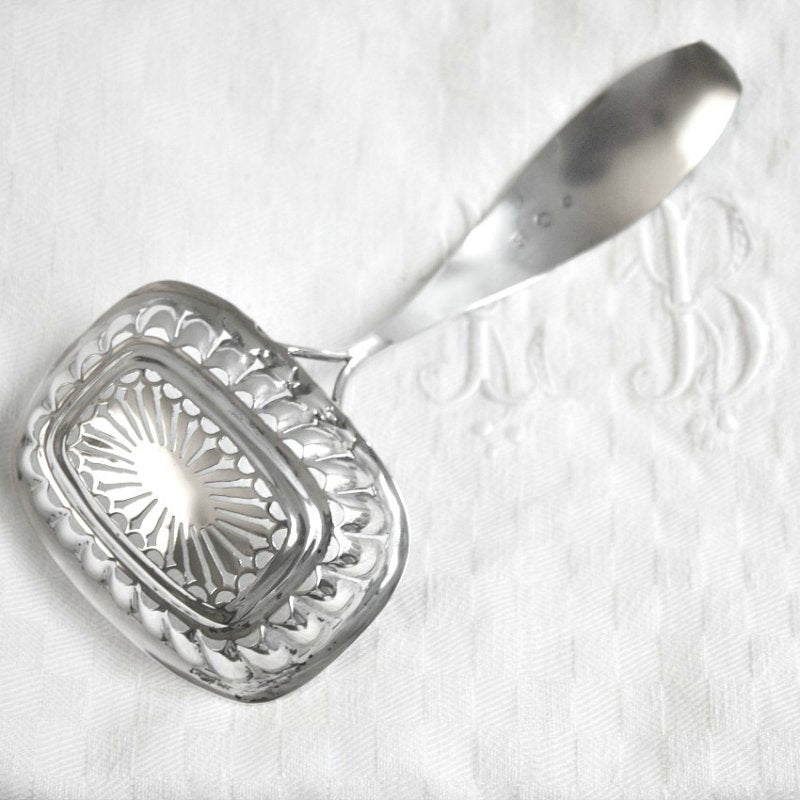 Exceptional early 19th-century sterling silver sugar sifter, 6‑1/2" x 3" x 2‑1/4", rare and collectible. Perfect for elegant table settings or luxury collections.