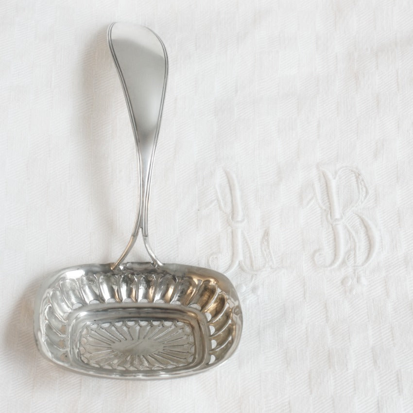 Exceptional early 19th-century sterling silver sugar sifter, 6‑1/2" x 3" x 2‑1/4", rare and collectible. Perfect for elegant table settings or luxury collections.