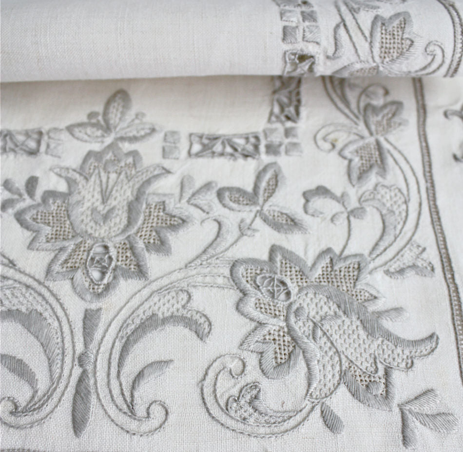 antique embroidered setting for 6 with tulip flowers