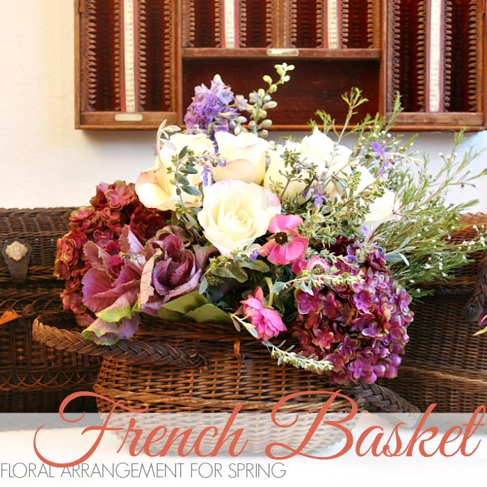 FLORAL ARRANGEMENT FOR SPRING IN AN ANTIQUE BASKET