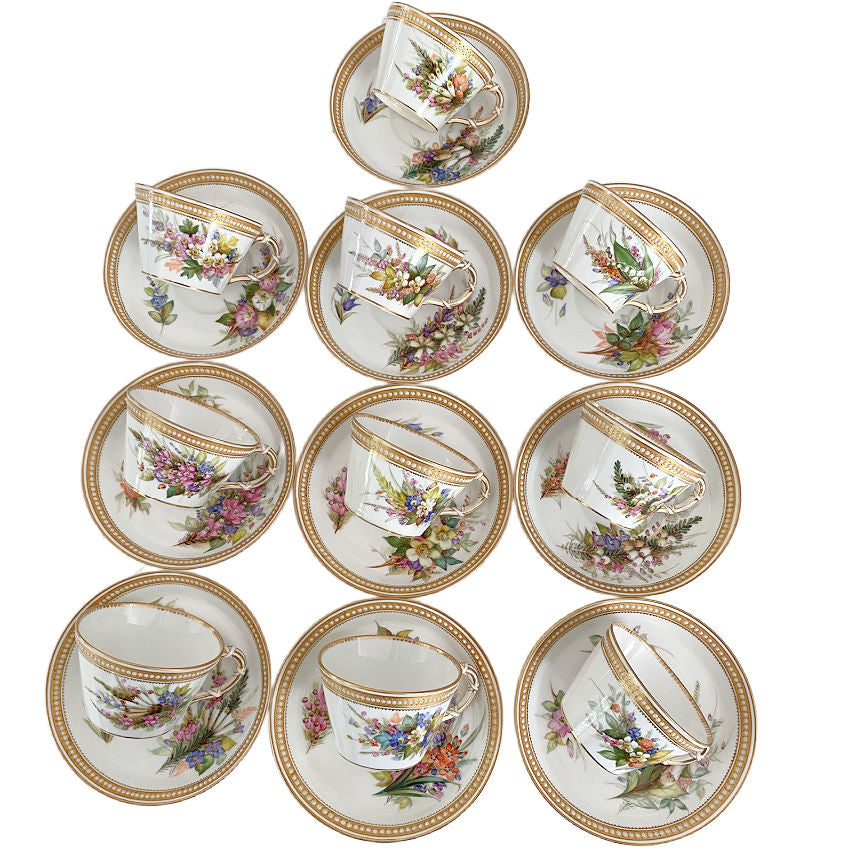 Ten antique Royal Worcester hand-painted floral cups and saucers with raised jeweled decoration, dated 1877
