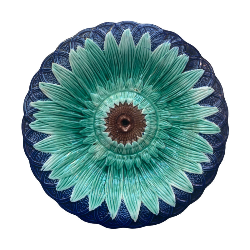 19th century majolica sunflower plate with cobalt basket detail