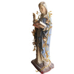 side view of 19th Century French Colonial Polychrome St Theresa of Avila, made of carved wood, and a layer of gesso under the painted finish. Exceptional!