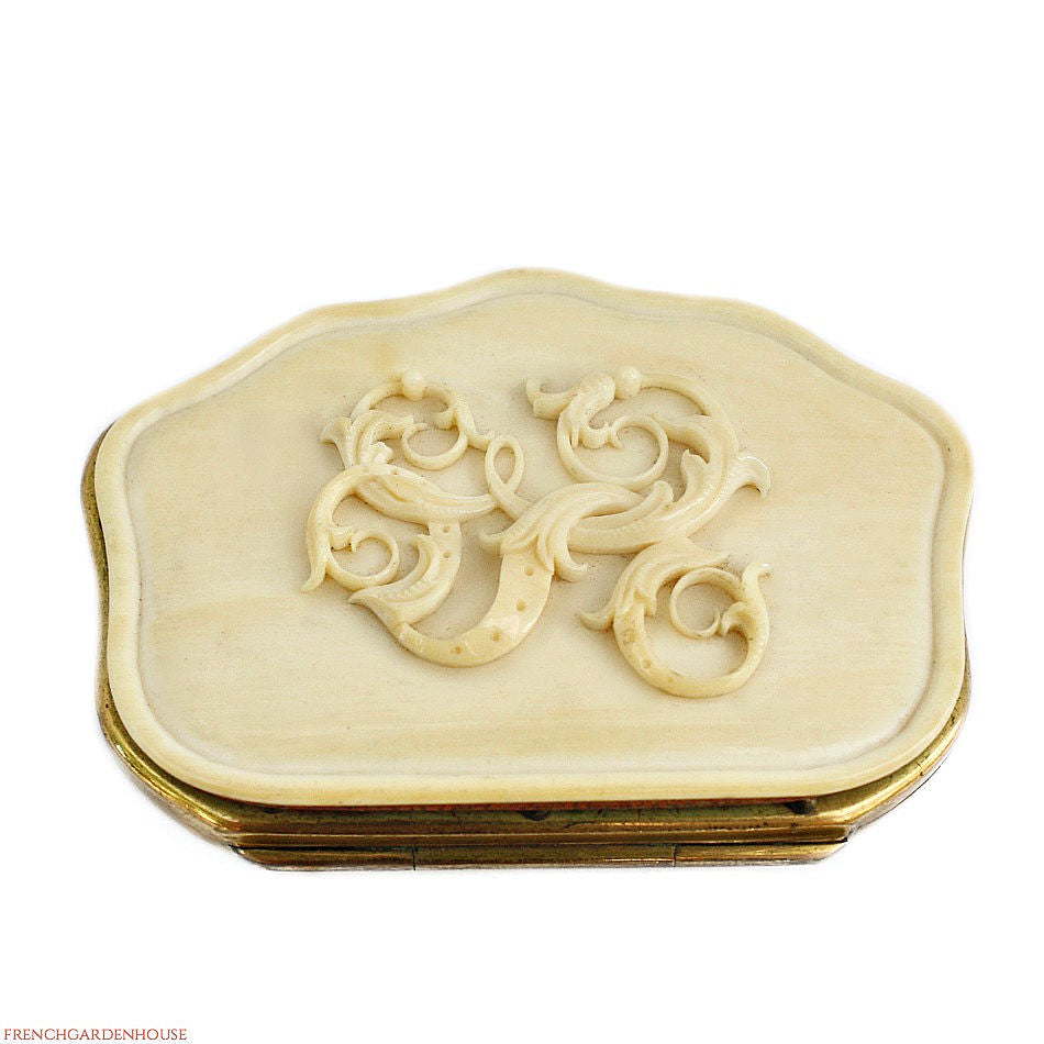 An antique French carved celluloid coin purse with a monogrammed design, rare find!