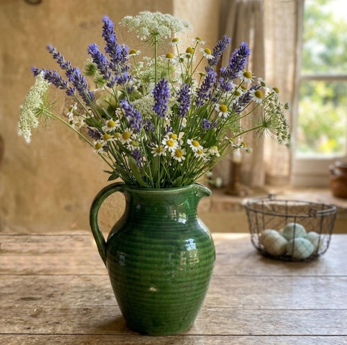 French provincial pottery pitcher styled with fresh flowers