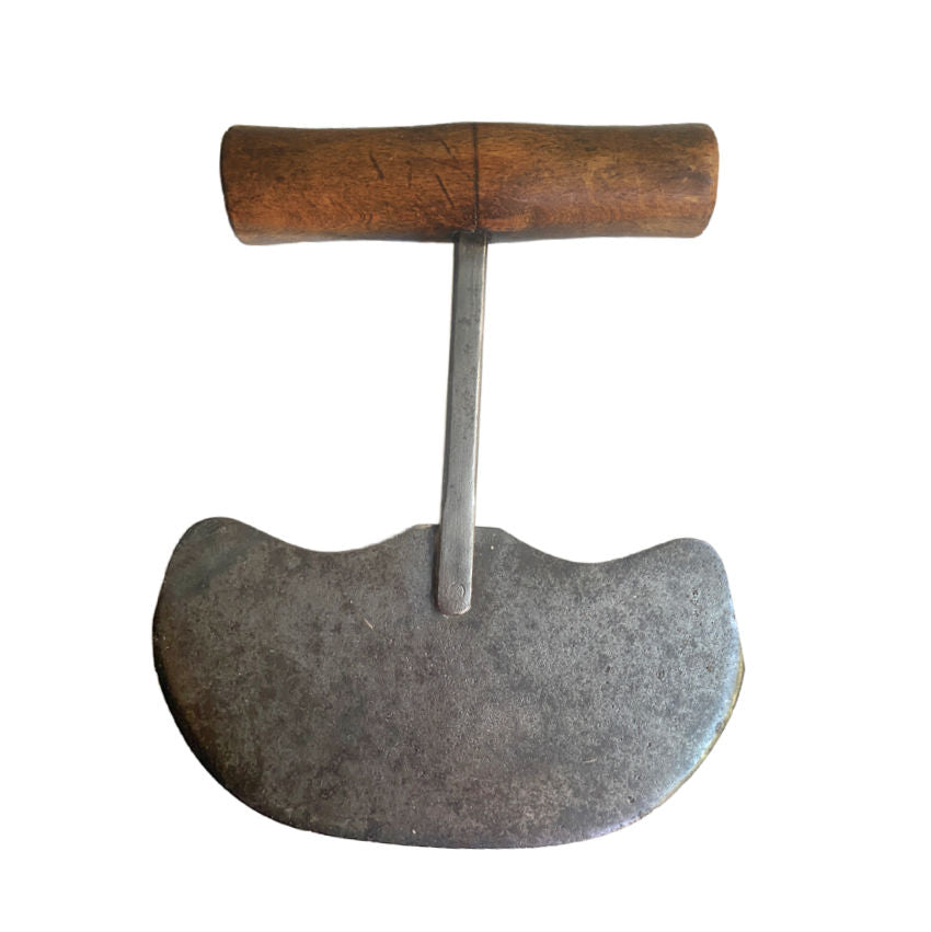 Metal cleaver with wooden handle on a white background