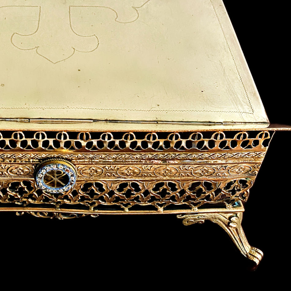 clsoe up of Antique French gilt brass book holder with adjustable support folded flat