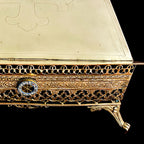 clsoe up of Antique French gilt brass book holder with adjustable support folded flat