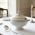 Antique E. Clarke ironstone sauce tureen styled on an elegant English country house dining table