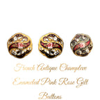 Set of three French antique champleve enameled buttons with pink rose designs and gold-colored filigree.