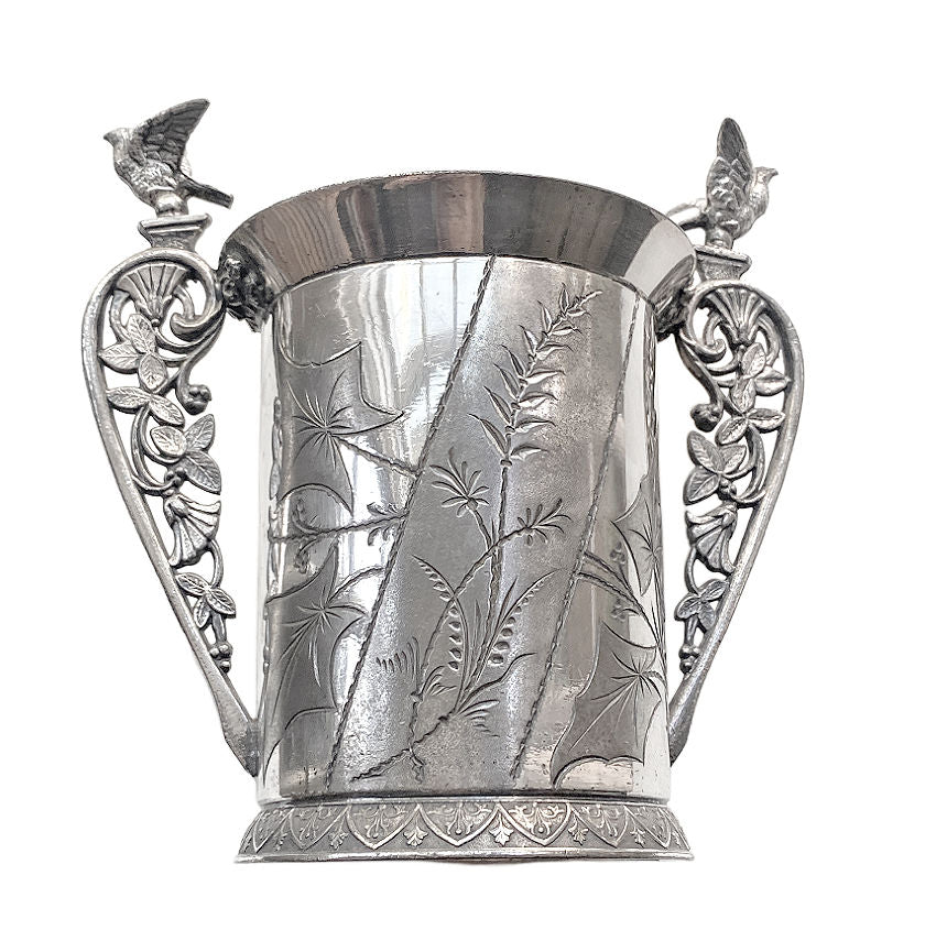 Victorian silver, antique silver plate, Aurora Silver Plate Co, antique spooner, bird motif, Victorian tableware, American antique silver, 19th century silver, decorative arts, nature inspired design, collectible silver, antique dining decor, Victorian decor, silver bird handles, French Garden House style, engraved silver, antique serving piece, silver collector, antique table accessory, botanical engraving