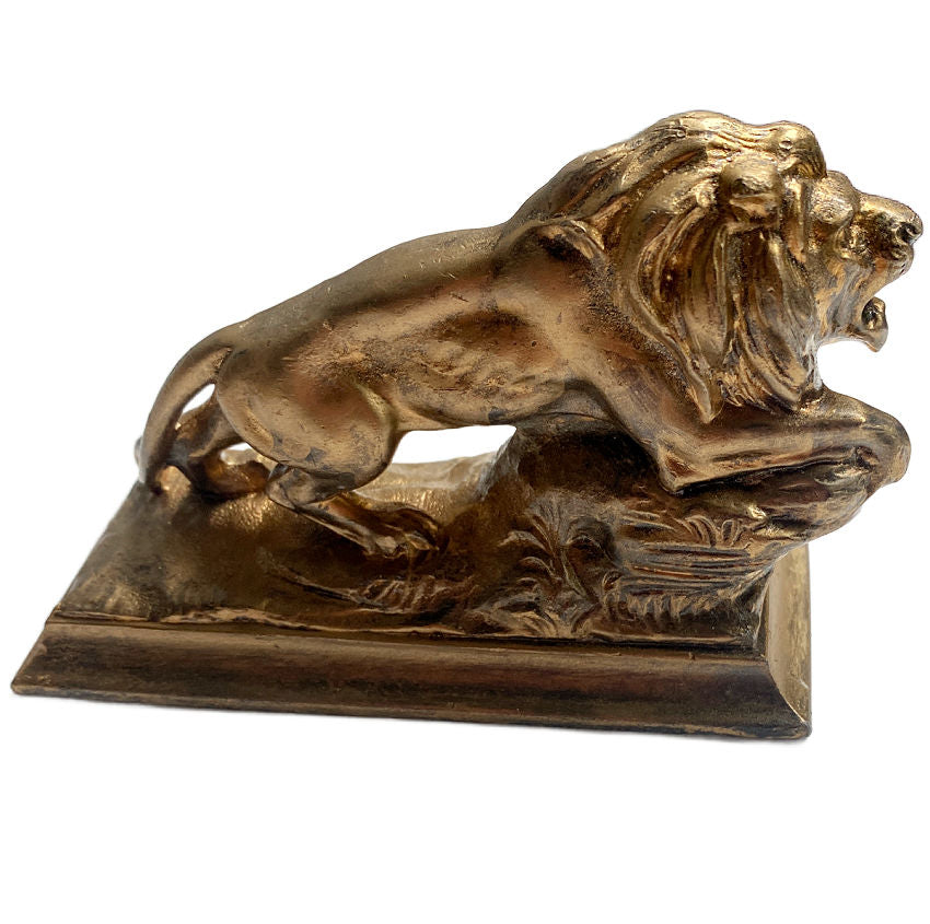 gilded metal lion presse papier with rich patina and elegant detail. A classic French desk accessory adding charm and sophistication to any décor.