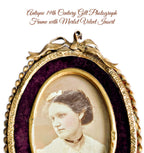 Detail of ornate gilt frame with rich merlot velvet backing interior