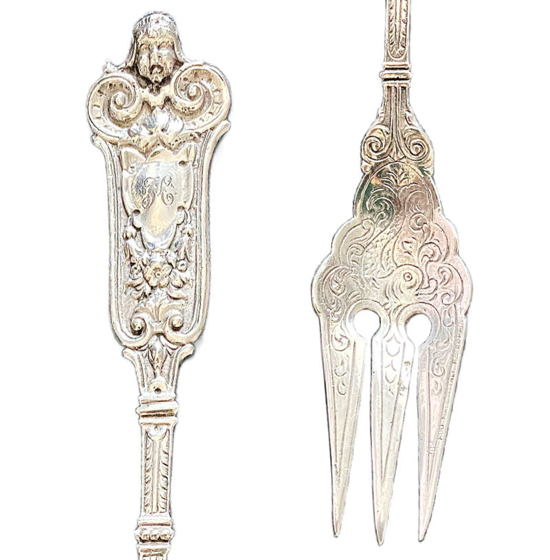 Antique Fratelli Coppini Solid Silver Serving Fork with Cherub and a barouque dolphin sterling