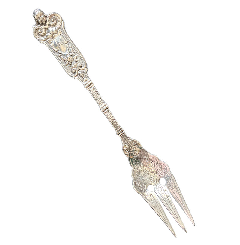 Antique Fratelli Coppini Solid Silver Serving Fork with Cherub and a barouque dolphin sterling