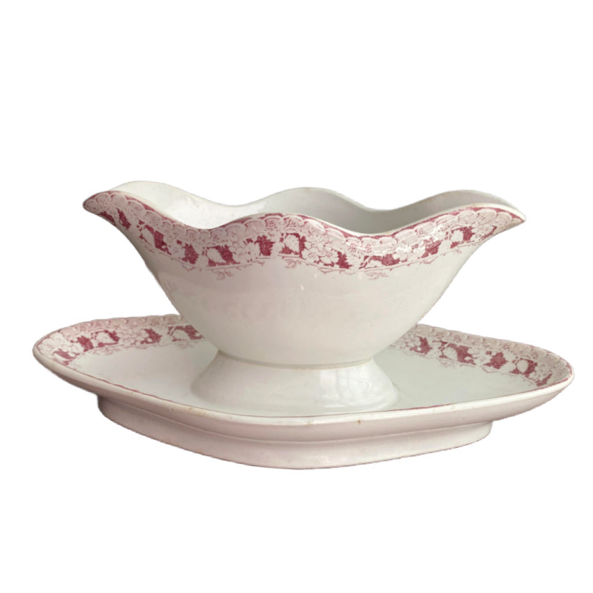 Antique French St. Amand porcelain sauce boat with red leaf design. Elegant Belle Époque tableware with timeless French charm.